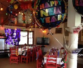 Happy New Year party decorations in clubhouse space 